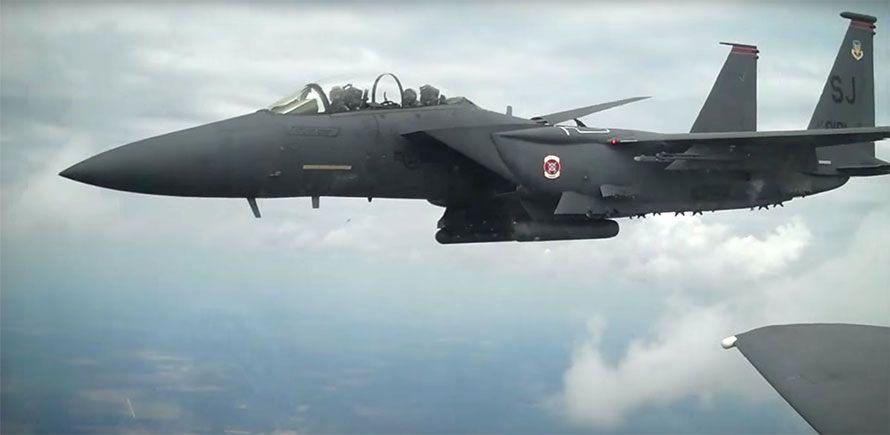f-15 strike eagle fighter jets wingtip to wingtip