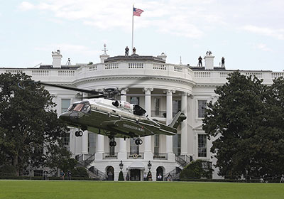 A developmental VH-92A helicopter conducts landing and take-off testing at the White House South Lawn in September 2018.
